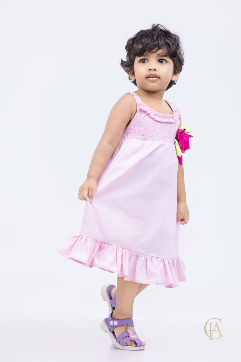  Soft blush‑pink dress