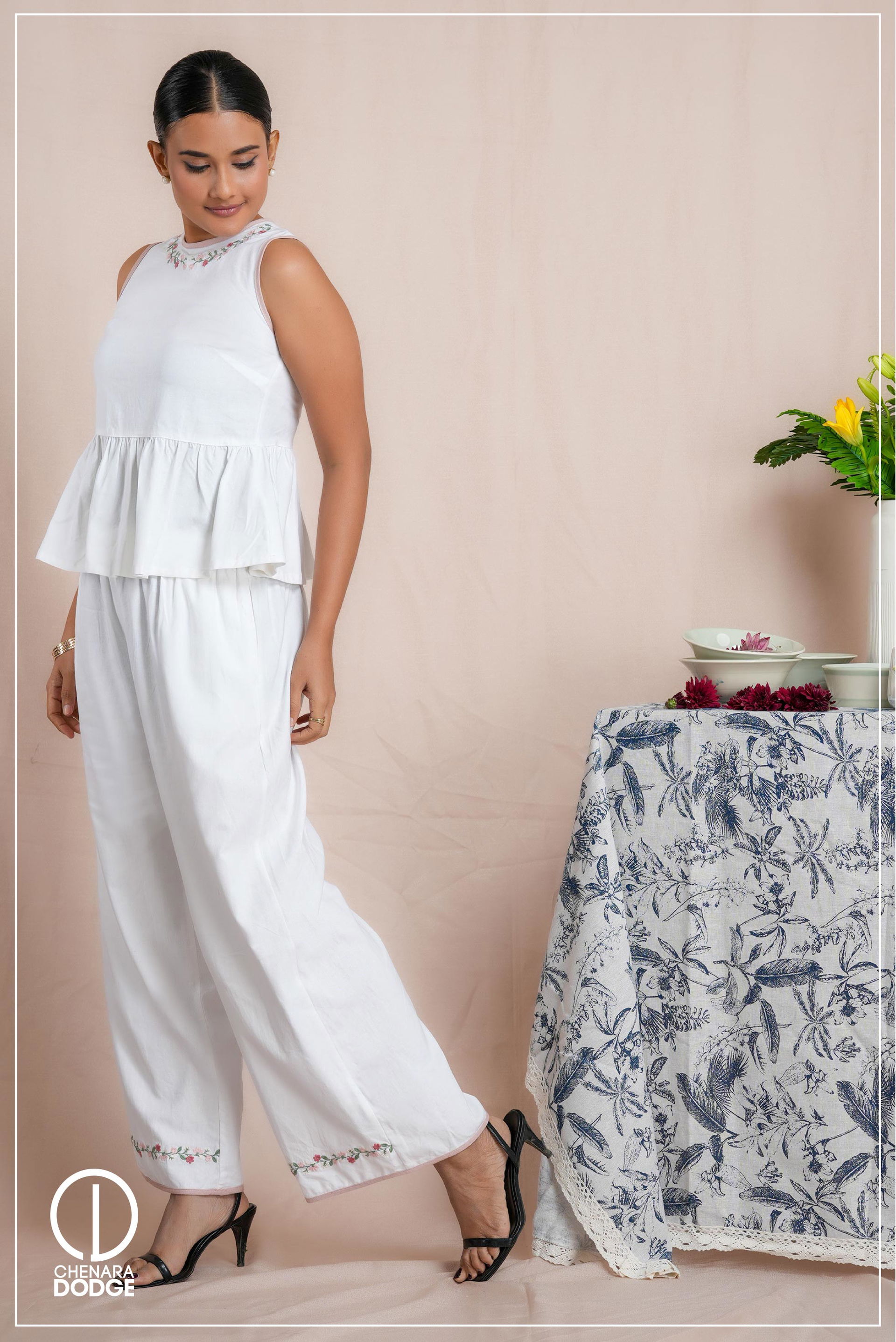 DIANE RUFFLE HEM PEPLUM EMB TOP