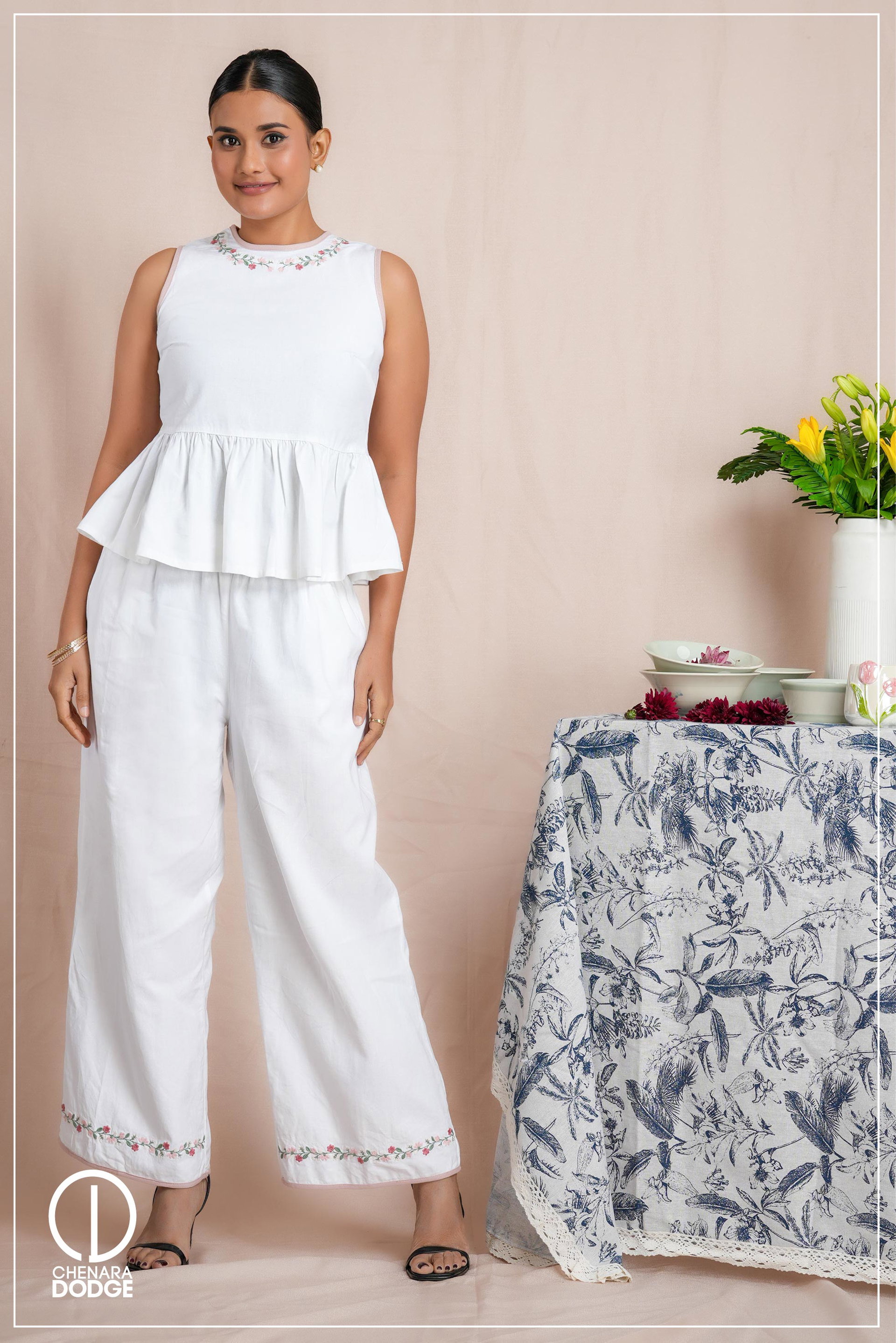 DIANE RUFFLE HEM PEPLUM EMB TOP