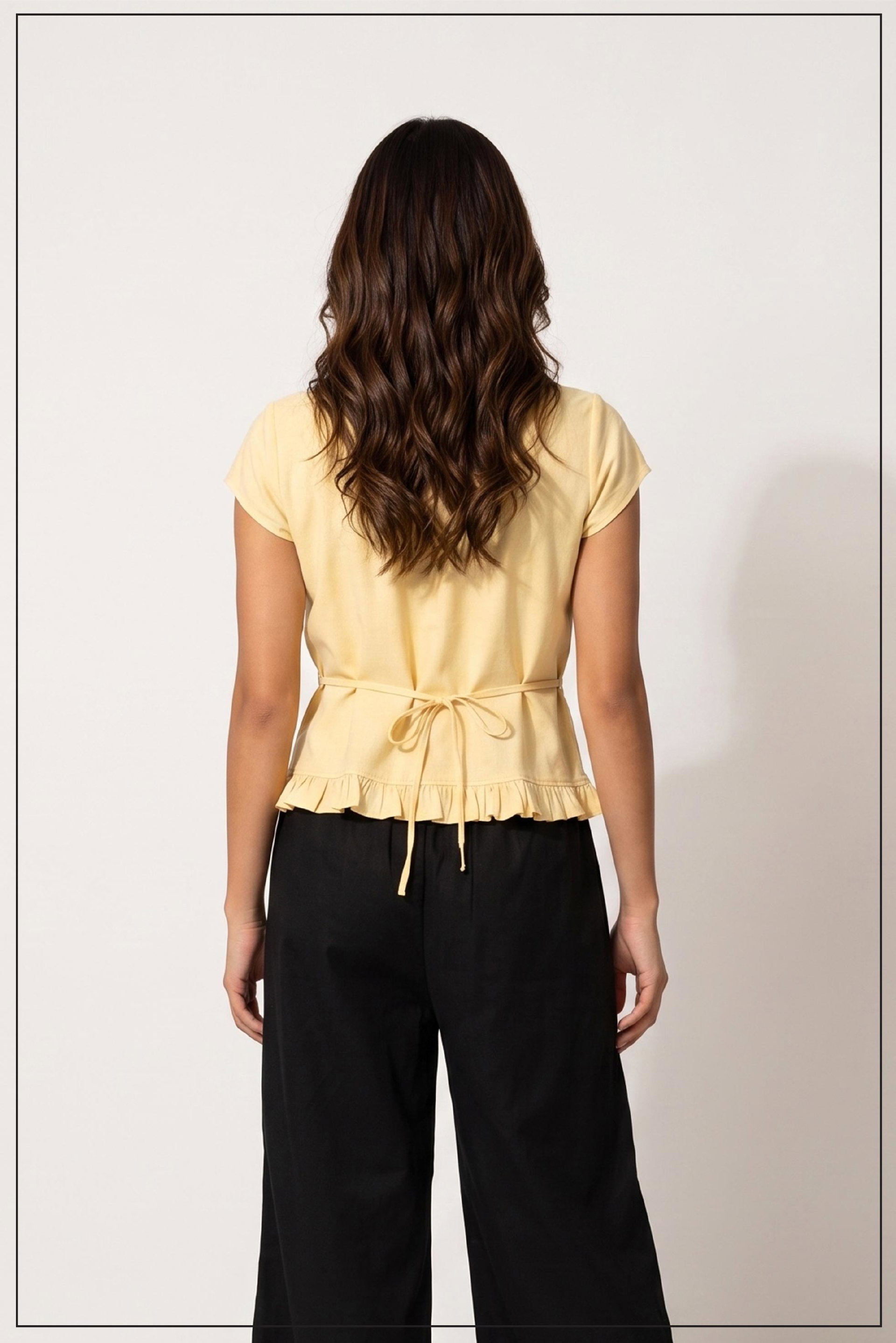 MELANIA RUFFLE HEM TOP