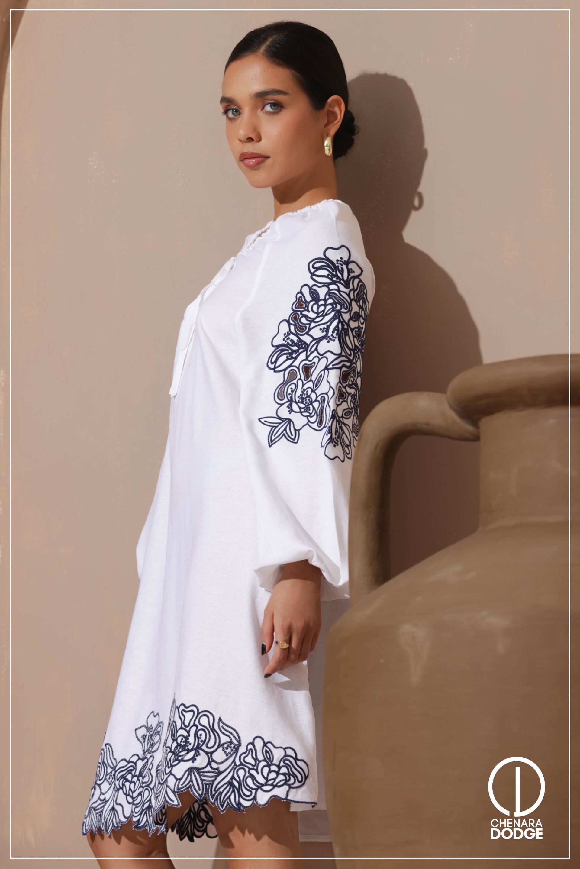 NUDE EMBROIDERED MINI DRESS